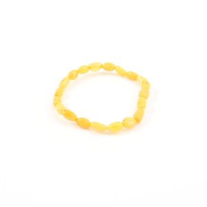 Antique Color Amber Stretch Bracelet. Irregular- shape amber beads set on elastic cord. Genuine Baltic amber bracelet.